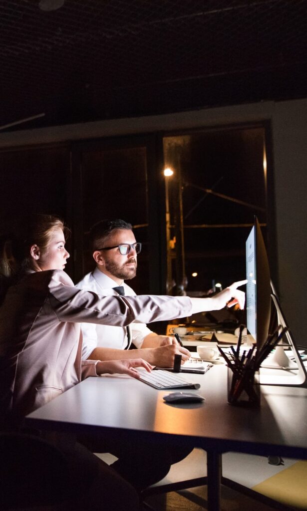 Spy Wizards cybersecurity specialists reviewing a security dashboard